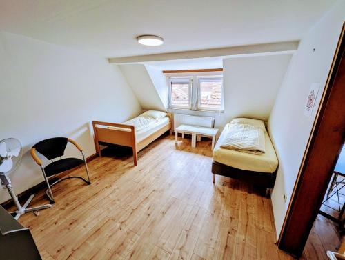 Postel nebo postele na pokoji v ubytování Monteurhaus Mömlingen