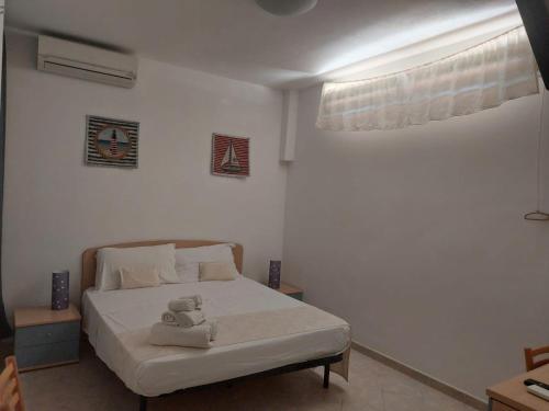 Ένα ή περισσότερα κρεβάτια σε δωμάτιο στο Locanda Basement Rooms