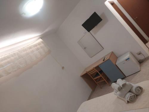 Μια τηλεόραση ή/και κέντρο ψυχαγωγίας στο Locanda Basement Rooms