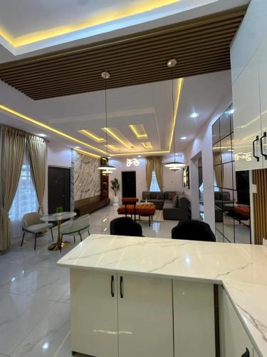 a living room with a couch and a table at OTamazingapartment in Akobo