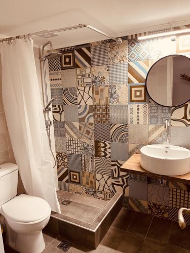 Ένα μπάνιο στο Noa Urban Retreat Apartment