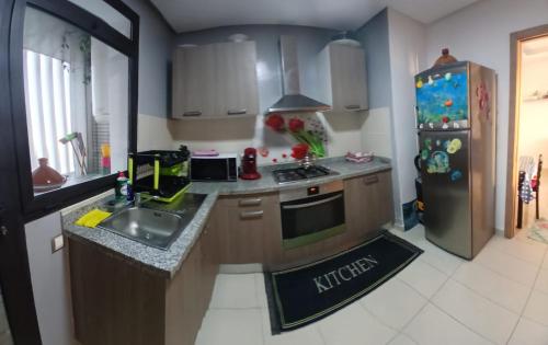 Η κουζίνα ή μικρή κουζίνα στο Apartment at Plage des Nations