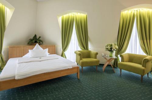 Un ou plusieurs lits dans un hébergement de l'établissement Hotel Artrium am Park