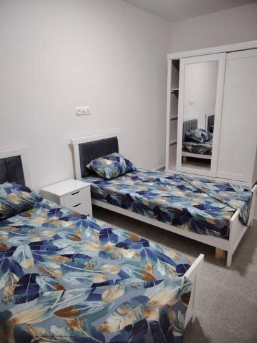 Llit o llits en una habitació de Résidence les phares