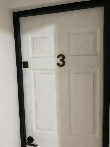 a door with the number on it at DGM Lofts GPE 3 Parque Fundidora in Monterrey