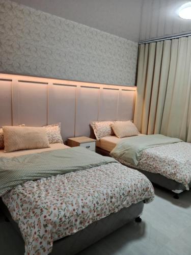 Ένα ή περισσότερα κρεβάτια σε δωμάτιο στο Maribert Studio Unit with free parking