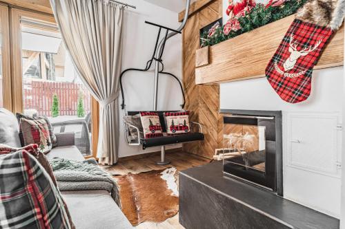 Posezení v ubytování Nosalowski Wypas Jacuzzi & Sauna