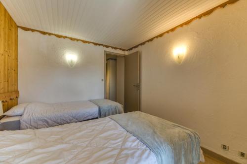 Ένα ή περισσότερα κρεβάτια σε δωμάτιο στο Chalet Crocus