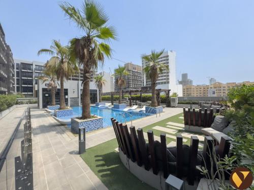 Vogue Vacation Homes, JVC Chaimaa Avenue near Circle Mall, One Bedroom Apartment with Balcony and City View, Access to all Amenities