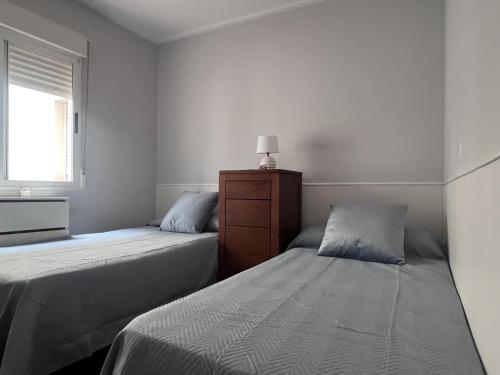 Katil atau katil-katil dalam bilik di Apartamento céntrico Albacete