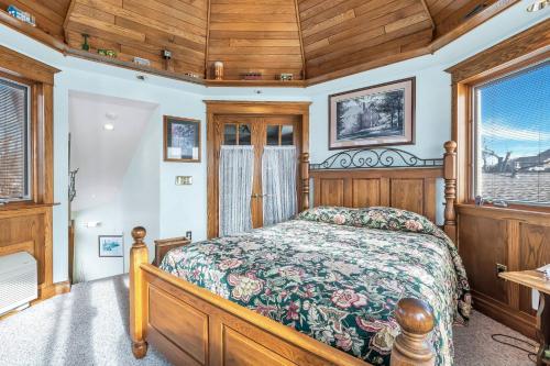 a bedroom with a bed and a wooden ceiling at Clarks Summit Gem w/ Private Yard & Parking in Newton Center
