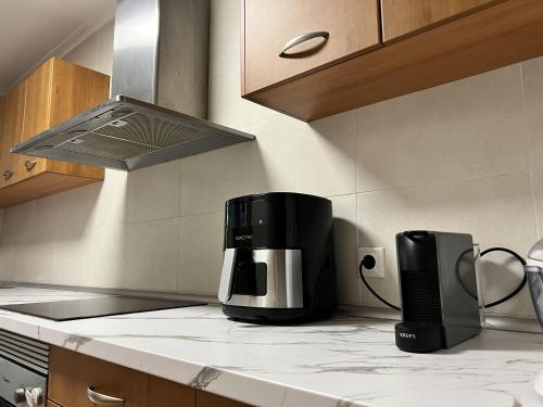 a coffeemaker sitting on a counter in a kitchen at Apartamento cerca Universidad de Albacete in Albacete