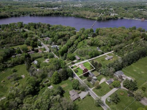 an aerial view of a park with a lake at Fisher's Fancy l Near the river & in house games in Berrien Springs