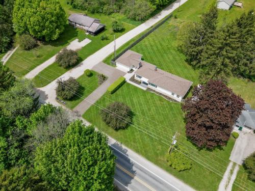 an aerial view of a house and a street at Fisher's Fancy l Near the river & in house games in Berrien Springs