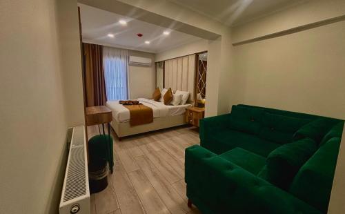 Un ou plusieurs lits dans un hébergement de l'établissement Galata Master Hotel