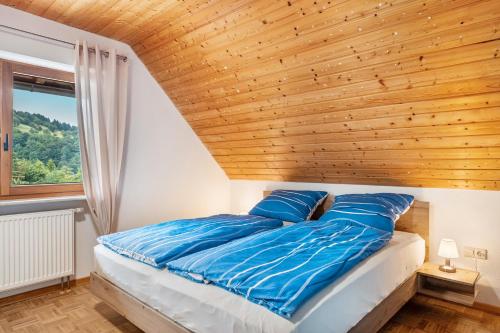 Postel nebo postele na pokoji v ubytování Haus Grünblick