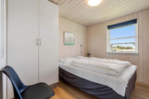 Ένα ή περισσότερα κρεβάτια σε δωμάτιο στο 3397-Hvide-Sande-Anker-Eskildsens-Vej-12