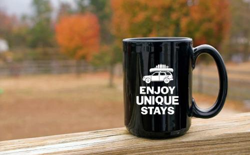a black coffee mug with a car on it at Apple Valley Gables-Cozy mountain home with views in Hendersonville