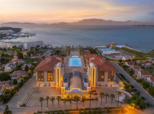 an aerial view of a resort with the ocean at Radisson Blu Resort & Spa Cesme in Cesme