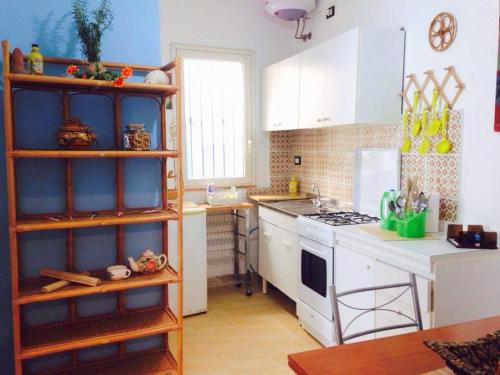 Кухня или мини-кухня в Case Vazzana - Cortile Sant'Agostino
