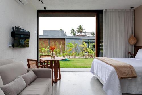 Postel nebo postele na pokoji v ubytování Kasa Leme