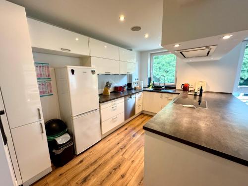 Kuchyň nebo kuchyňský kout v ubytování Citynah und Chic bei Hamburg