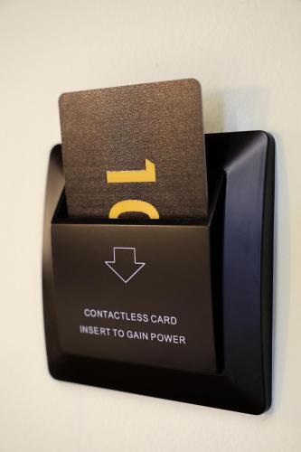 a black box with a sign for a wireless card at Hotel Dusha at Kruja's Mountain in Krujë