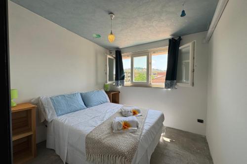 Postel nebo postele na pokoji v ubytování Terrazzino Frontemare Wi-Fi Free Parking