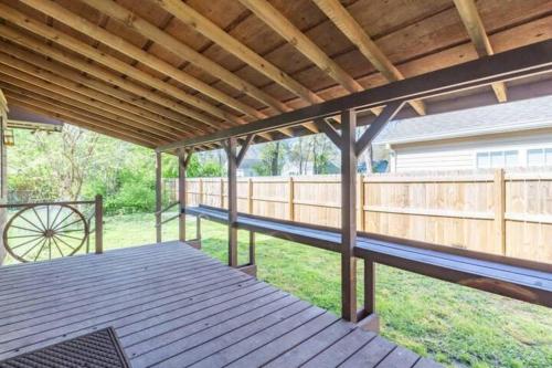 a patio with a wooden deck with a wooden roof at Pawnee 2 - Newly Renovated Duplex in Chattanooga