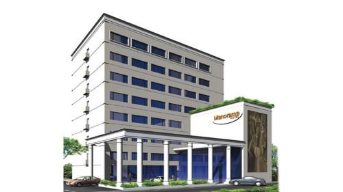 a rendering of the exterior of a hotel at Hotel Manorama Vijayawada in Vijayawāda
