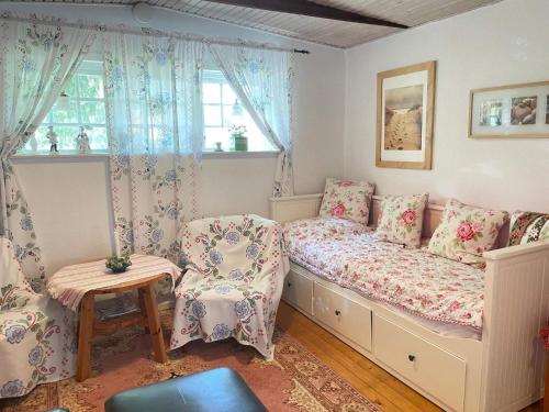a bedroom with a bed and a window at 4 star holiday home in HÖLLVIKEN in Höllviken