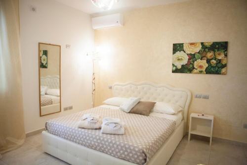 Postel nebo postele na pokoji v ubytování B&B La Gioiosa
