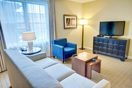 TV a/nebo společenská místnost v ubytování Wyndham Long Wharf 2BR Apartment with Resort Access