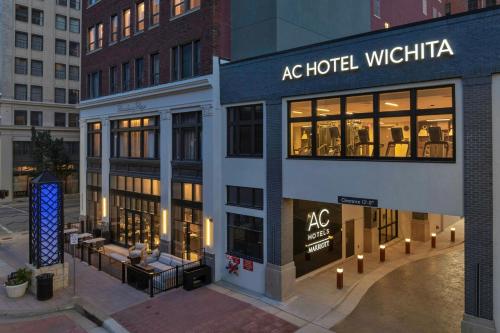 a store front of a hotel wrightia in a city at AC Hotel by Marriott Wichita Downtown in Wichita