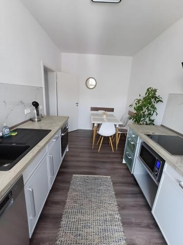 Kuchyň nebo kuchyňský kout v ubytování Haus Gera