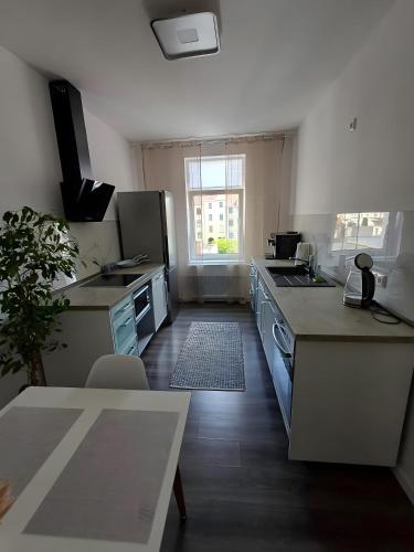 Kuchyň nebo kuchyňský kout v ubytování Haus Gera