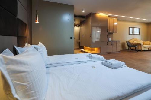 Ένα ή περισσότερα κρεβάτια σε δωμάτιο στο Home Lux