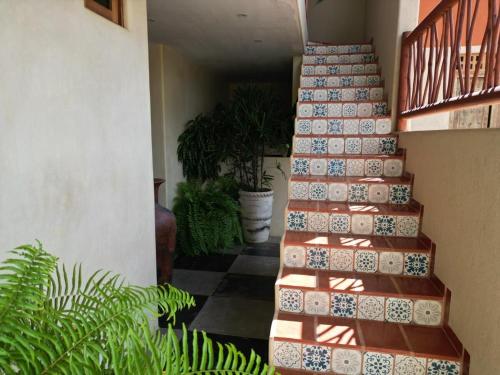 a stairway with a set of ceramic tiles at Casa Tula in Cedro