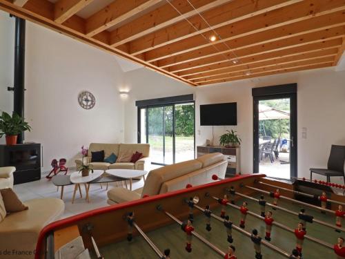 a living room with a pool table at Maison ancienne avec sauna, babyfoot, billard, proche station thermale et forêt domaniale - FR-1-497-136 in La Chapelle d'Audaine