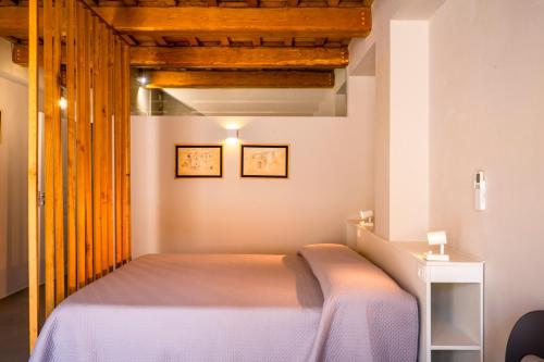 a bedroom with a bed in a room at Garden apartment, wifi and private parking in Porto SantʼElpidio