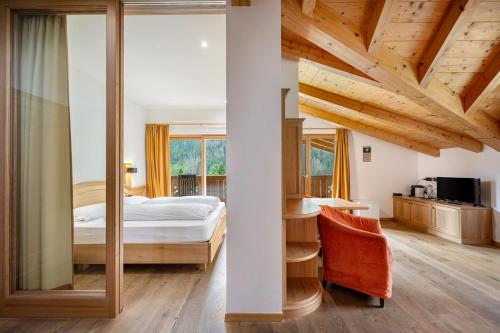 Postel nebo postele na pokoji v ubytování Hotel Brunello