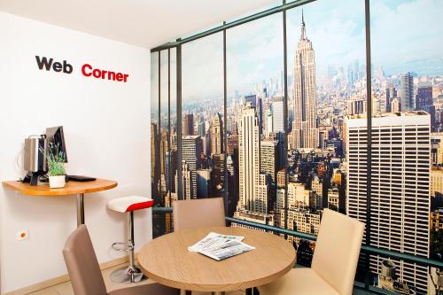 a meeting room with a view of the city at Residhome Reims Centre in Reims