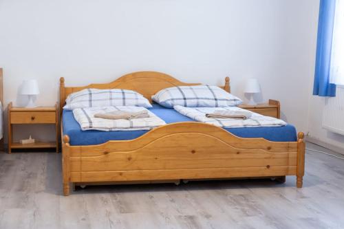 Una cama o camas en una habitación de Penzion U Františka