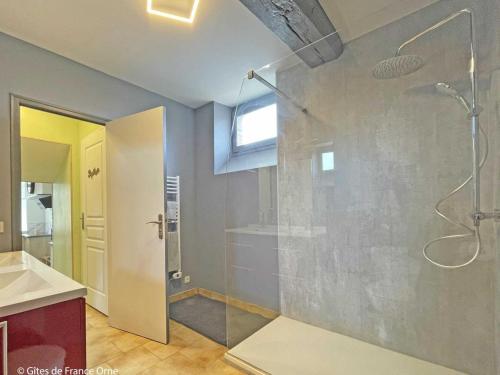 a bathroom with a shower and a sink at Charmante maison près de Domfront avec 3 ch, animaux admis - FR-1-497-201 in Saint-Gilles-des-Marais
