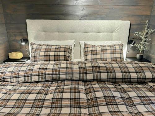 Postel nebo postele na pokoji v ubytování Modern Apartment At Strandafjellet Ski Resort