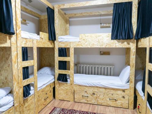Postel nebo postele na pokoji v ubytování Bozui Hostel