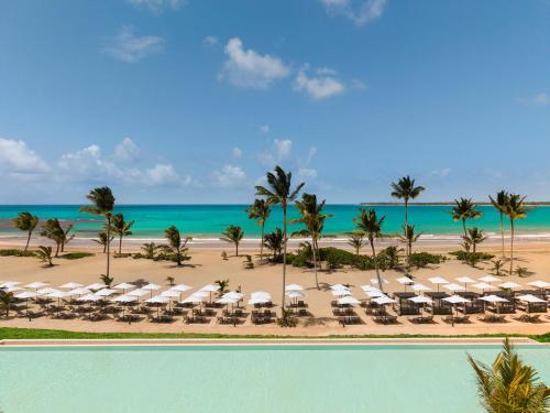 an aerial view of a resort with a pool at Secrets Playa Esmeralda Resort & Spa - All Inclusive in Miches