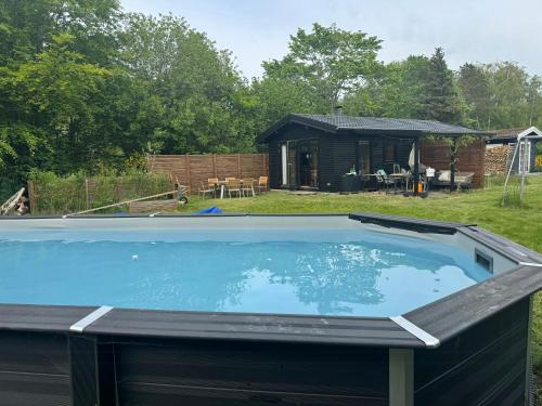 Swimmingpoolen hos eller tæt på Authentecity Between Forest And Beach In Odsherred