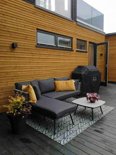Χώρος καθιστικού στο Modern Cabin With Sea Views On Bjørkøya