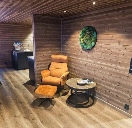 Posezení v ubytování Luxurious Family Cabin By The Ski Trails